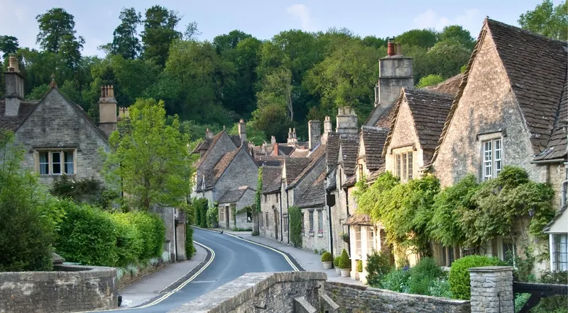 The honey-stone main street of Castle Combe, one of England's prettiest small-group tour villages